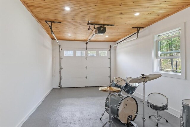 garage with baseboards, recessed lighting, and wood ceiling