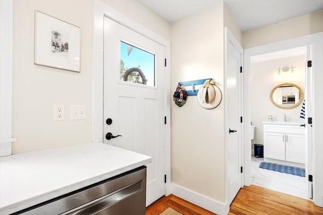 6 Macdonald Ter Unit E, Scituate, MA 02066 - entrance foyer featuring baseboards