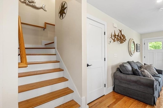 6 Macdonald Ter Unit E, Scituate, MA 02066 - staircase with wood finished floors and baseboards