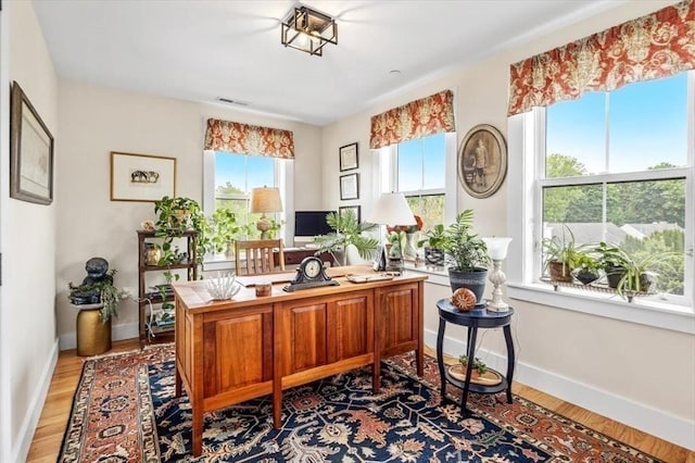 6 Macdonald Ter Unit E, Scituate, MA 02066 - office area featuring wood finished floors and baseboards