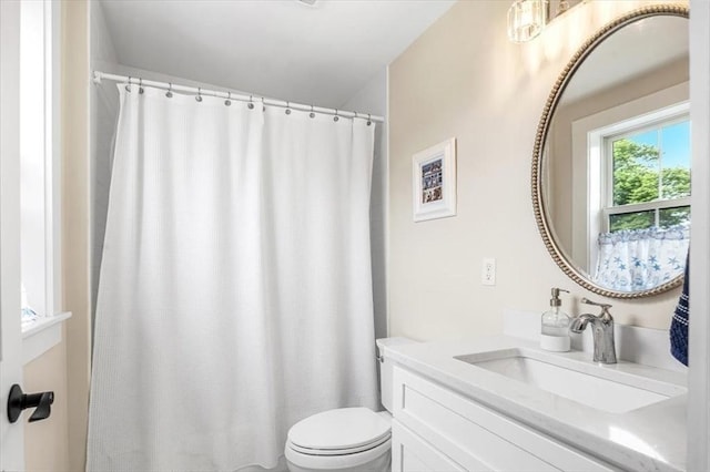 6 Macdonald Ter Unit E, Scituate, MA 02066 - bathroom with toilet, vanity, and curtained shower