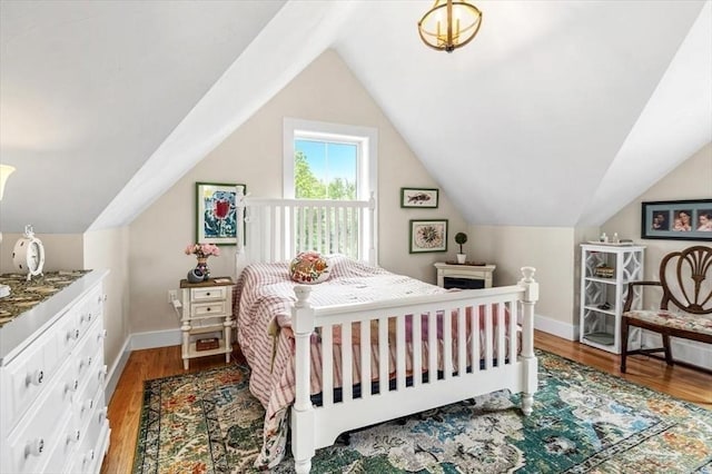 6 Macdonald Ter Unit E, Scituate, MA 02066 - bedroom featuring vaulted ceiling, wood finished floors, and baseboards