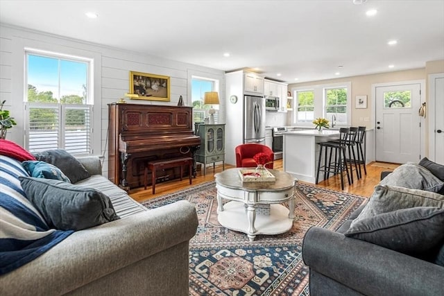 6 Macdonald Ter Unit E, Scituate, MA 02066 - living area with light wood finished floors and recessed lighting