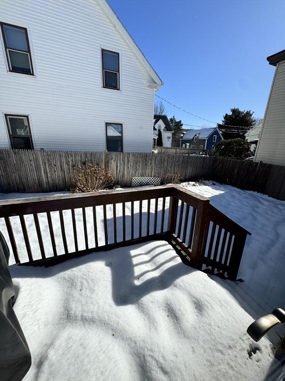 deck featuring a patio area and fence private yard