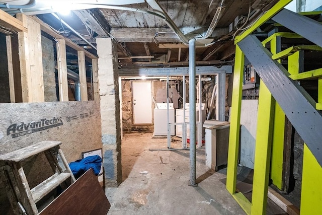 54 Hazard St, New Bedford, MA 02740 - unfinished basement featuring washer and clothes dryer