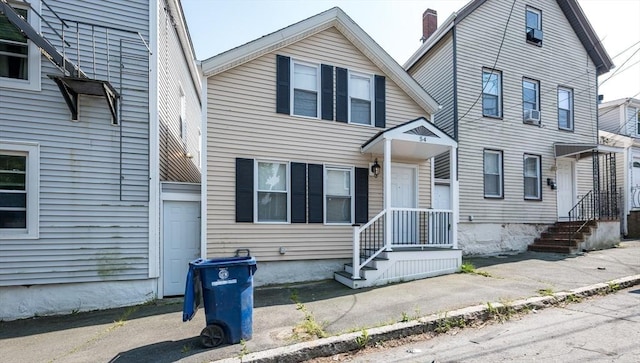 54 Hazard St, New Bedford, MA 02740 - view of front of home featuring a chimney