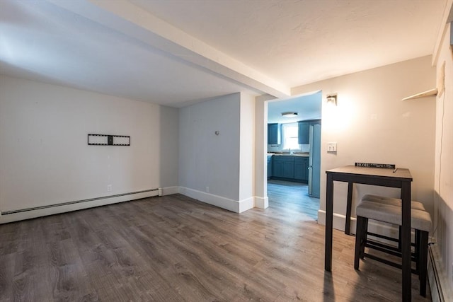 54 Hazard St, New Bedford, MA 02740 - empty room featuring wood finished floors and baseboard heating