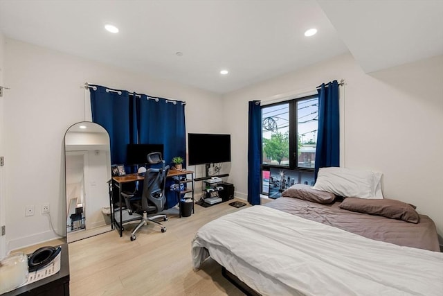 bedroom featuring light hardwood / wood-style floors