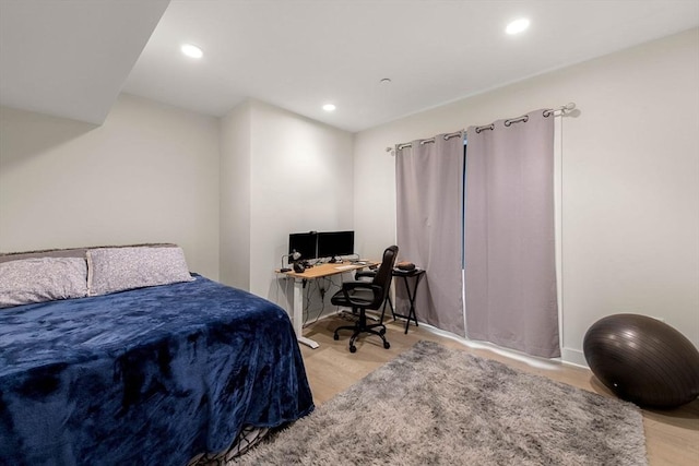 bedroom featuring light hardwood / wood-style floors