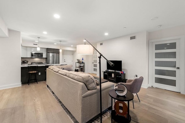 living room featuring light hardwood / wood-style floors