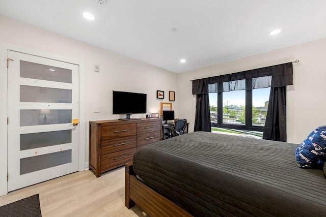 bedroom featuring light hardwood / wood-style floors