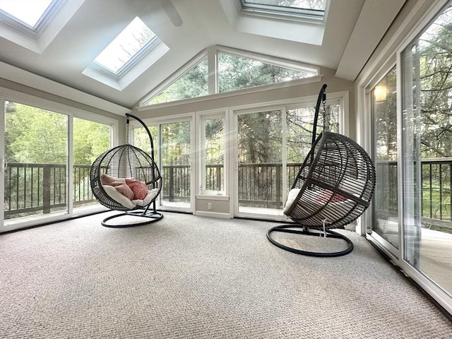 104 Channing Rd, Concord, MA 01742 - sunroom with a skylight, plenty of natural light, lofted ceiling, and carpet floors