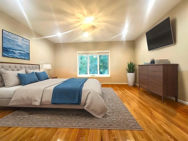 104 Channing Rd, Concord, MA 01742 - bedroom featuring light wood-style flooring, vaulted ceiling, and baseboards