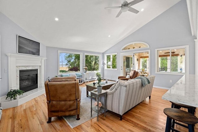 6 Riverview Dr, Newburyport, MA 01950 - living room with light wood-style flooring, ceiling fan, a high end fireplace, recessed lighting, and high vaulted ceiling