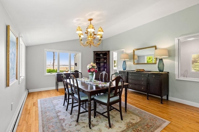 6 Riverview Dr, Newburyport, MA 01950 - dining space with a baseboard radiator, a chandelier, vaulted ceiling, light wood-style floors, and baseboards