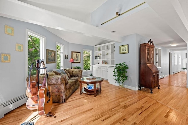 6 Riverview Dr, Newburyport, MA 01950 - living room featuring baseboard heating, light wood-type flooring, and baseboards