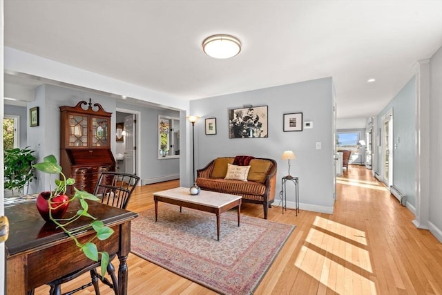 6 Riverview Dr, Newburyport, MA 01950 - living area with light wood-style flooring, baseboard heating, and baseboards