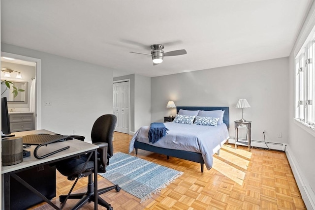 6 Riverview Dr, Newburyport, MA 01950 - bedroom featuring a baseboard heating unit, a desk, a closet, a ceiling fan, and baseboards
