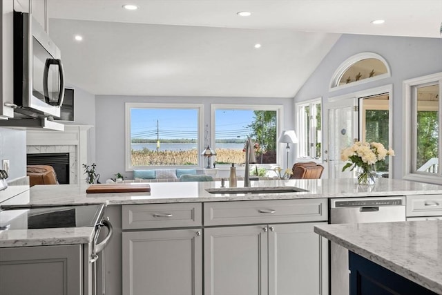 6 Riverview Dr, Newburyport, MA 01950 - kitchen featuring stainless steel appliances, a sink, plenty of natural light, lofted ceiling, and recessed lighting