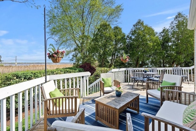 6 Riverview Dr, Newburyport, MA 01950 - wooden deck with outdoor dining area and outdoor lounge area
