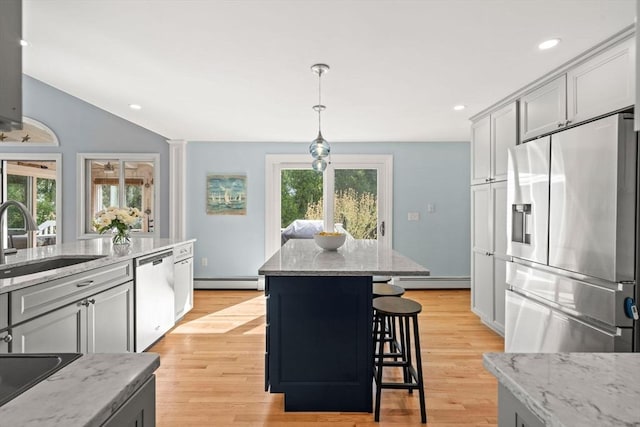 6 Riverview Dr, Newburyport, MA 01950 - kitchen with appliances with stainless steel finishes, a sink, a baseboard heating unit, light wood-type flooring, and recessed lighting