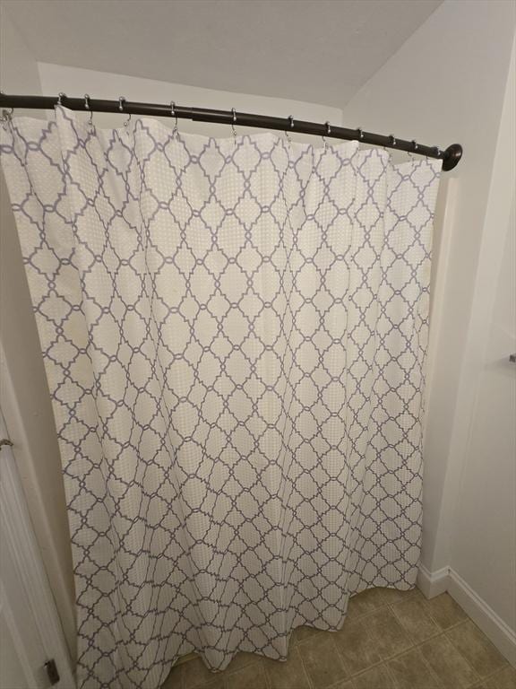 315 Cambridge St Unit 302A, Worcester, MA 01603 - bathroom view of a shower with shower curtain