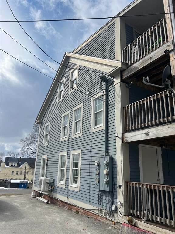 view of home's exterior featuring a balcony