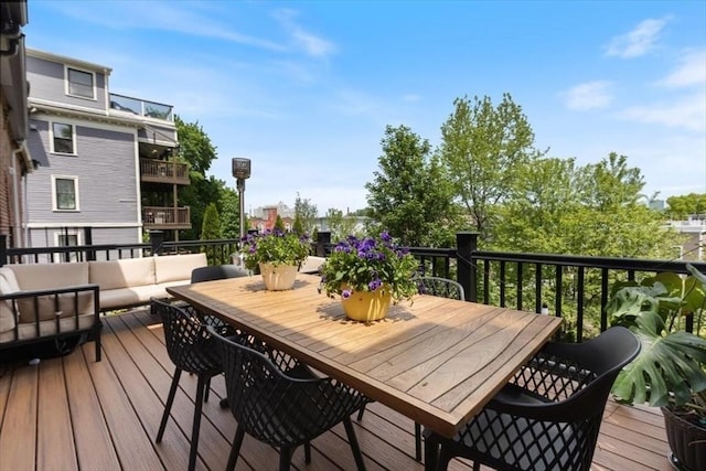 deck with an outdoor hangout area
