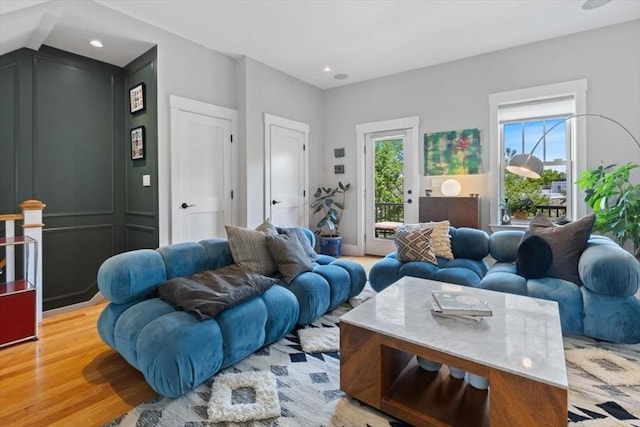 living room featuring wood finished floors and recessed lighting