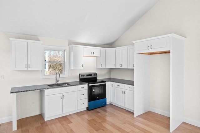 kitchen with sink, white cabinets, dark stone countertops, stainless steel electric range oven, and high vaulted ceiling