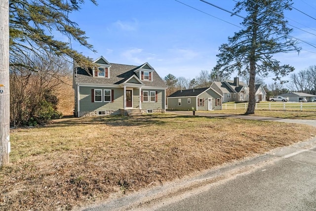 view of front facade with a front yard