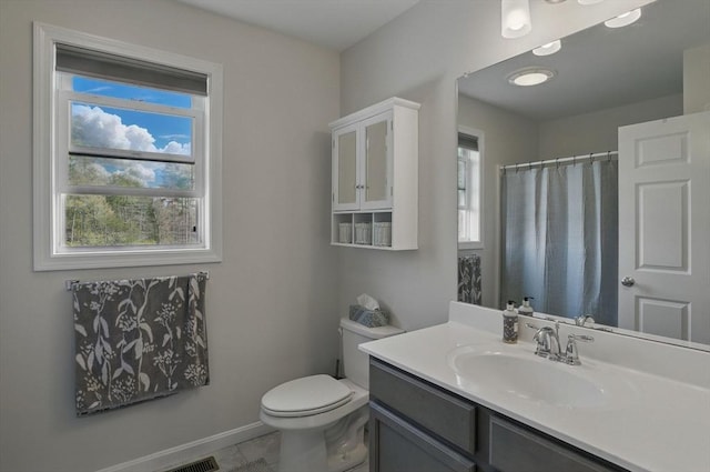 73 Sparrow Way, Raynham, MA 02767 - full bathroom with baseboards, a wealth of natural light, vanity, and toilet