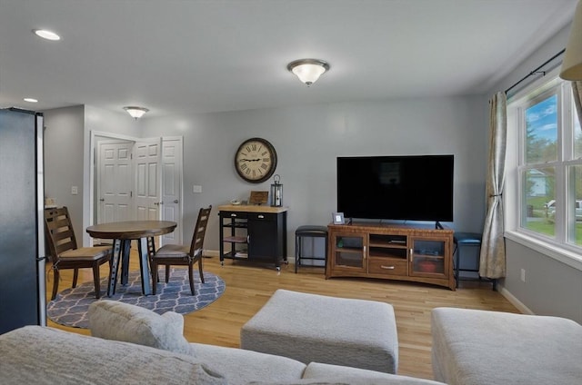 73 Sparrow Way, Raynham, MA 02767 - living area featuring wood finished floors, baseboards, and recessed lighting