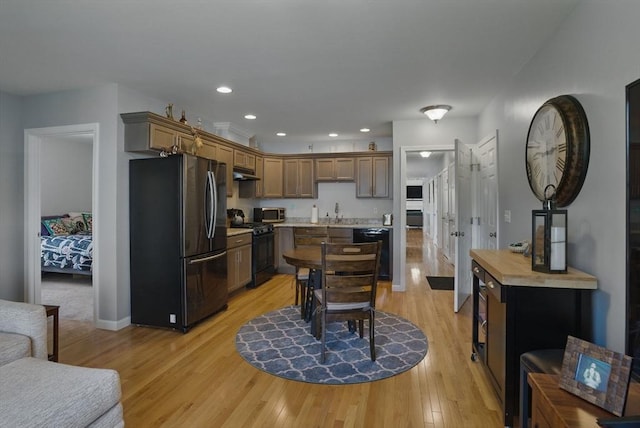 73 Sparrow Way, Raynham, MA 02767 - dining area with baseboards, light wood-style flooring, and recessed lighting