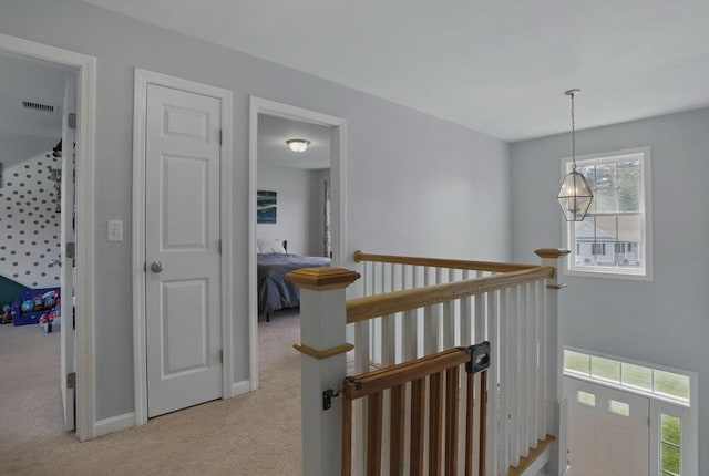 73 Sparrow Way, Raynham, MA 02767 - corridor featuring light carpet, baseboards, an upstairs landing, and visible vents