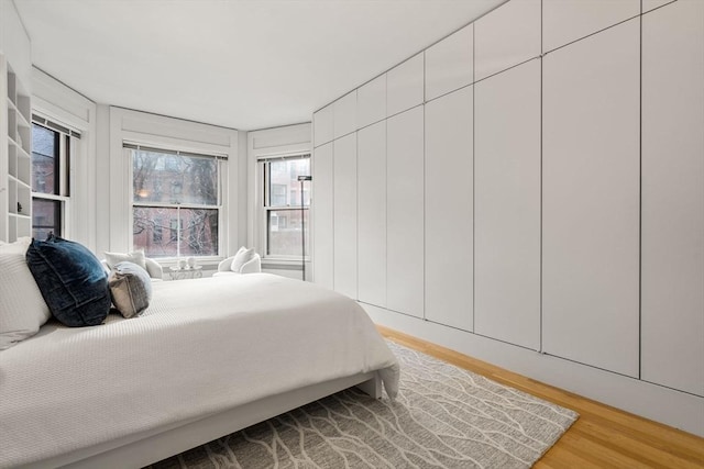 bedroom featuring light hardwood / wood-style floors