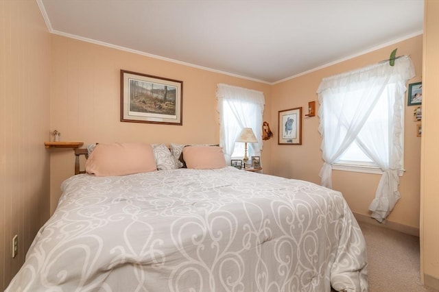 carpeted bedroom featuring crown molding