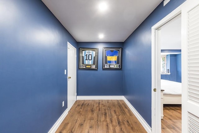 corridor featuring hardwood / wood-style flooring