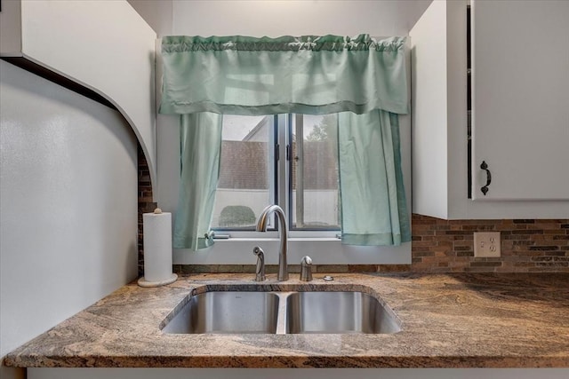 14 Cottage St, Whitman, MA 02382 - kitchen featuring stone counters and decorative backsplash