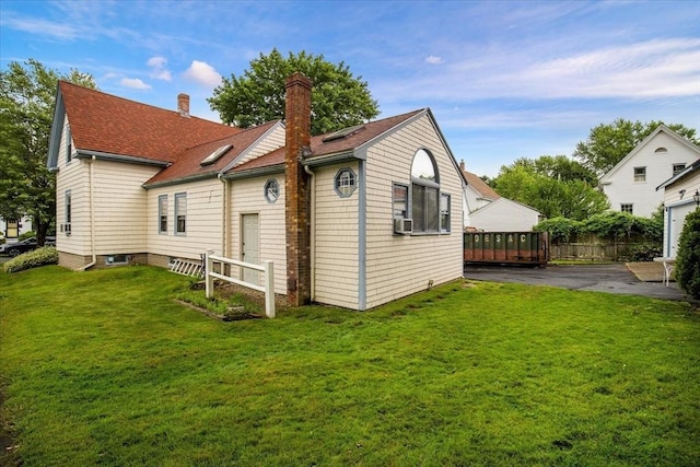 14 Cottage St, Whitman, MA 02382 - back of house with a chimney and a shingled roof