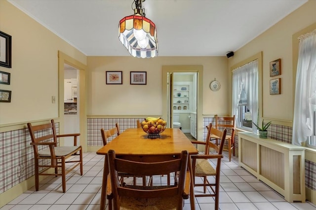14 Cottage St, Whitman, MA 02382 - dining space with wainscoting and light tile patterned floors