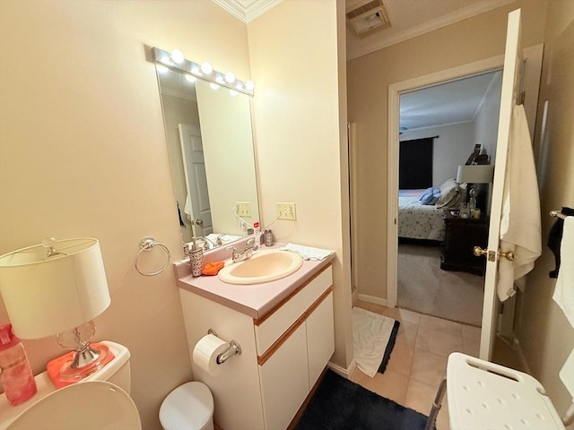 13 Dallas Dr Unit 308, Dracut, MA 01826 - bathroom with ornamental molding, vanity, connected bathroom, and tile patterned floors