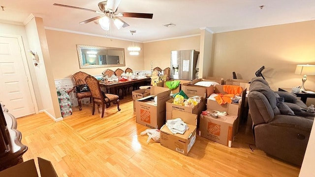 13 Dallas Dr Unit 308, Dracut, MA 01826 - living room featuring a ceiling fan, light wood-style floors, and ornamental molding