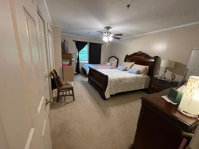 13 Dallas Dr Unit 308, Dracut, MA 01826 - bedroom with crown molding, light colored carpet, and a ceiling fan
