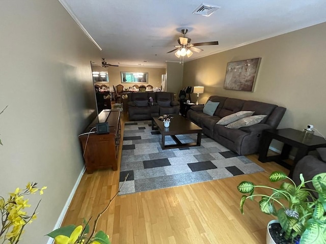 13 Dallas Dr Unit 308, Dracut, MA 01826 - living area with ceiling fan, ornamental molding, and wood finished floors