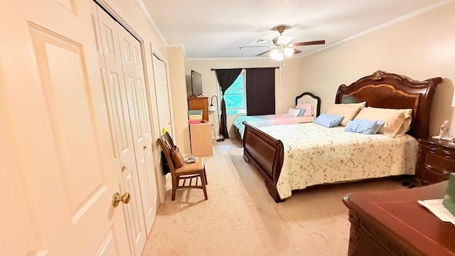 13 Dallas Dr Unit 308, Dracut, MA 01826 - bedroom with crown molding, light colored carpet, multiple closets, and a ceiling fan