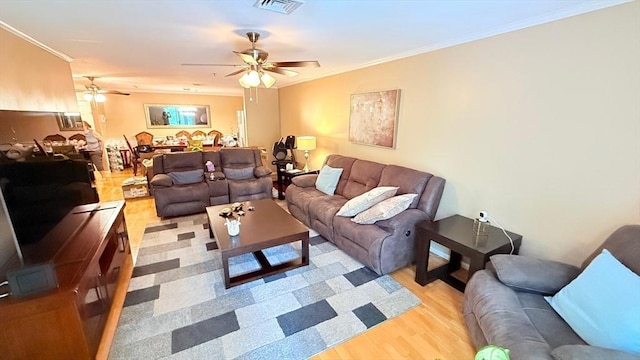 13 Dallas Dr Unit 308, Dracut, MA 01826 - living room featuring a ceiling fan, light wood-style floors, and ornamental molding