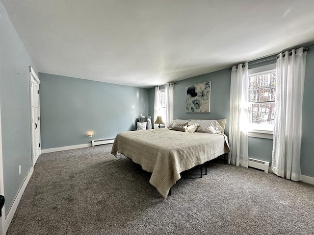 carpeted bedroom with a baseboard heating unit