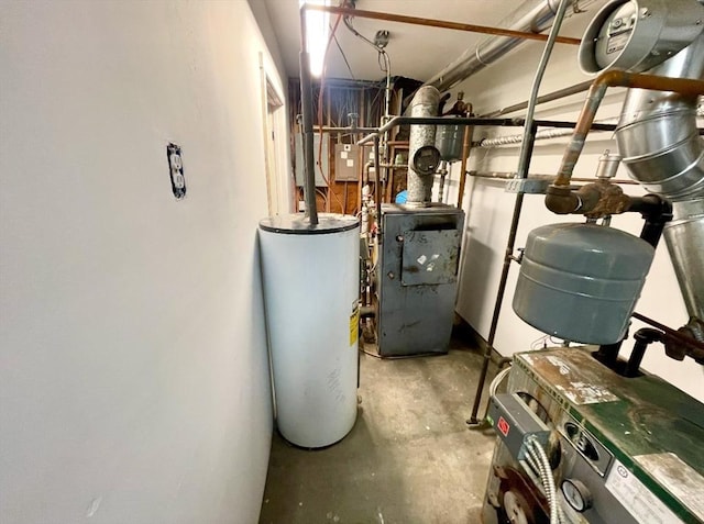 utility room featuring water heater