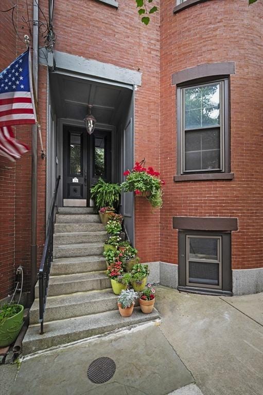 34 Beacon St Unit 3, Chelsea, MA 02150 - entrance to property with brick siding and french doors